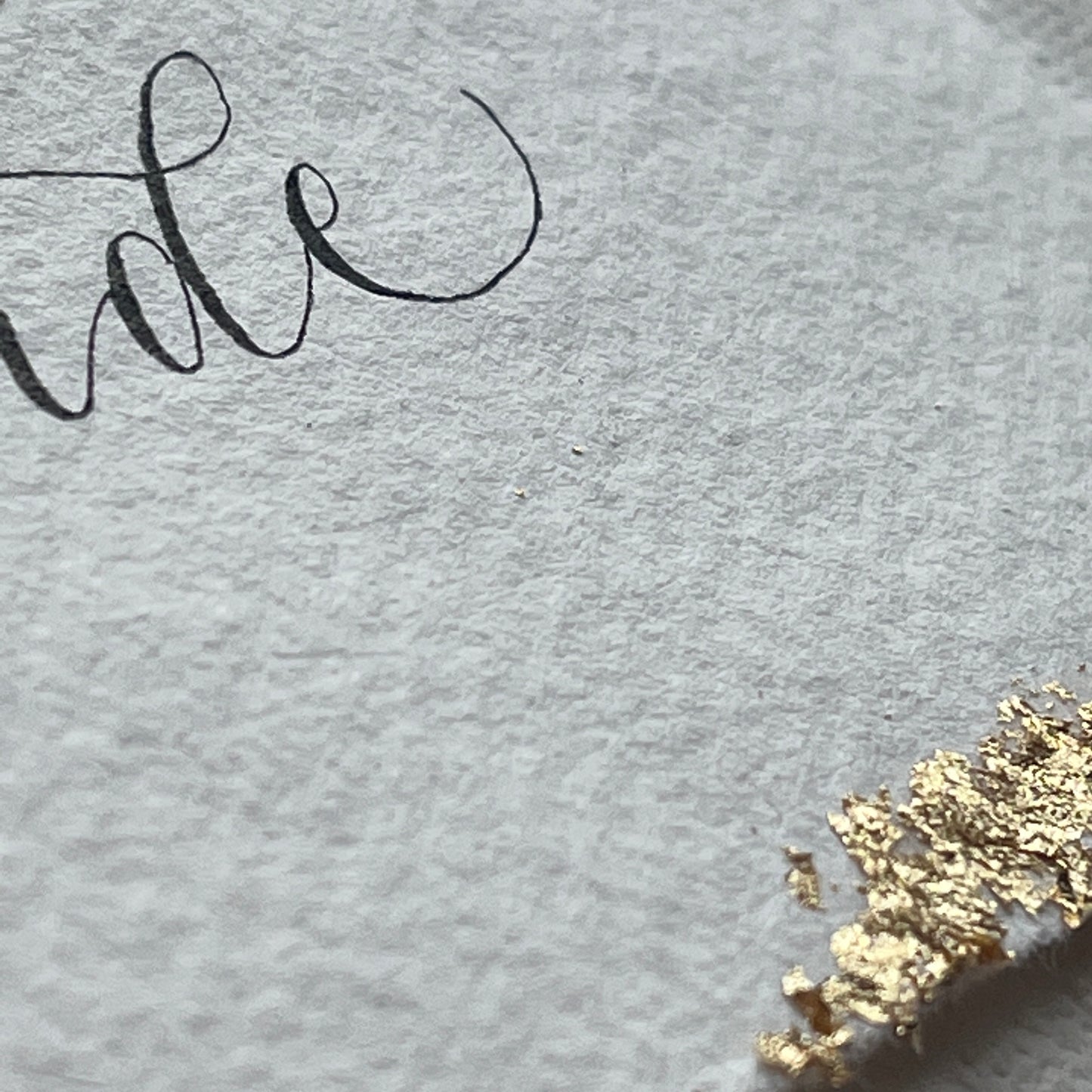Cotton paper place cards with handwritten calligraphy