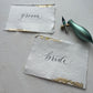 Handmade rag paper place cards with handwritten calligraphy