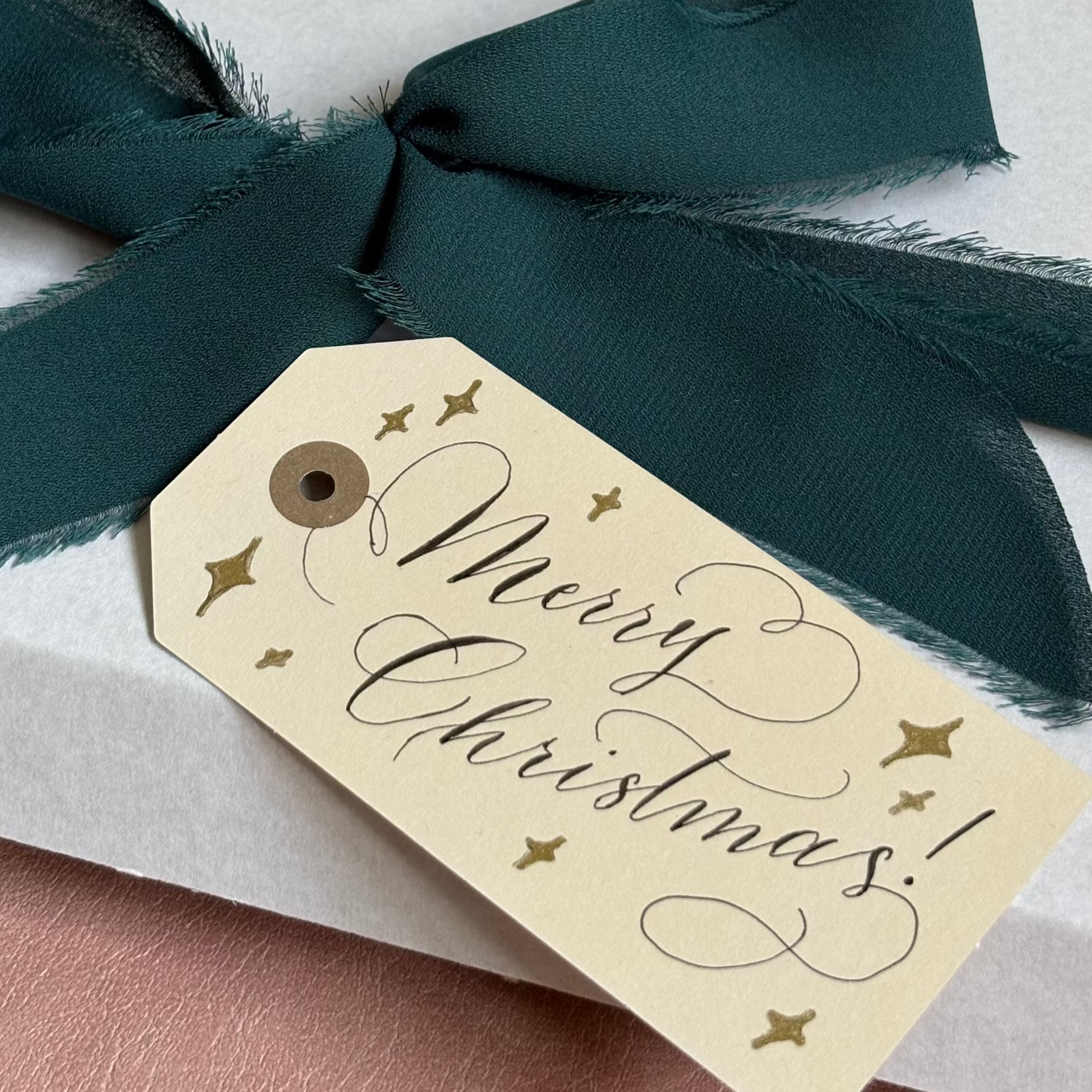 Merry Christmas gift tags Calligraphy Engraving Live Event Artist Personalisation London Hampshire Surrey Berkshire Jodie Rose Calligraphy