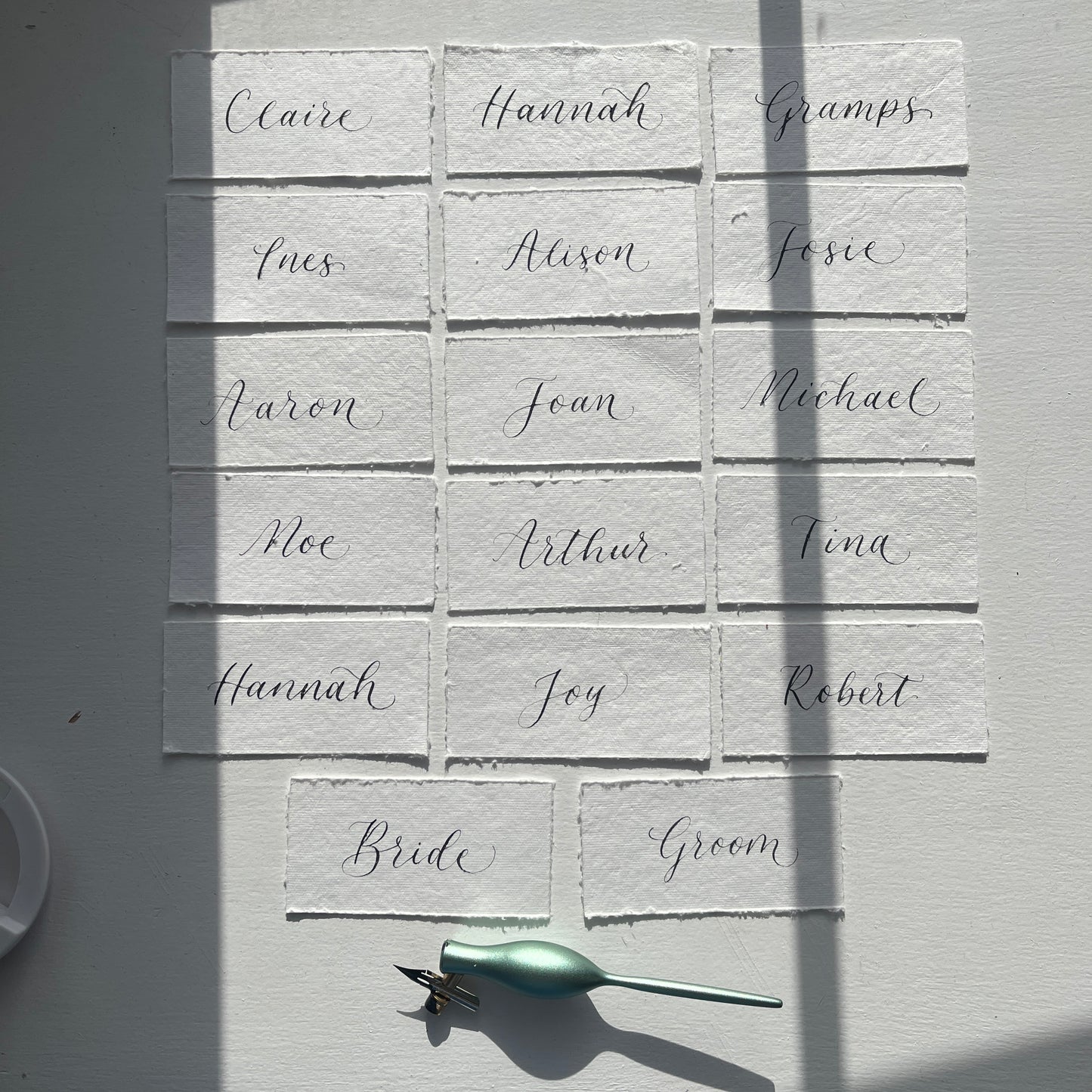 Handmade rag cotton paper with handwritten flourished calligraphy by Jodie Rose Calligraphy in Hampshire for weddings and events 