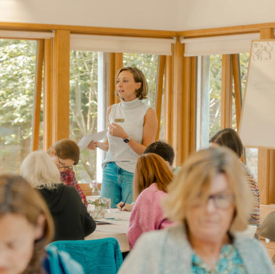 Participants at a Christmas calligraphy workshop creative art retreat, with an experienced instructor tutor 